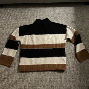 Striped sweater. Medium black white and orange.